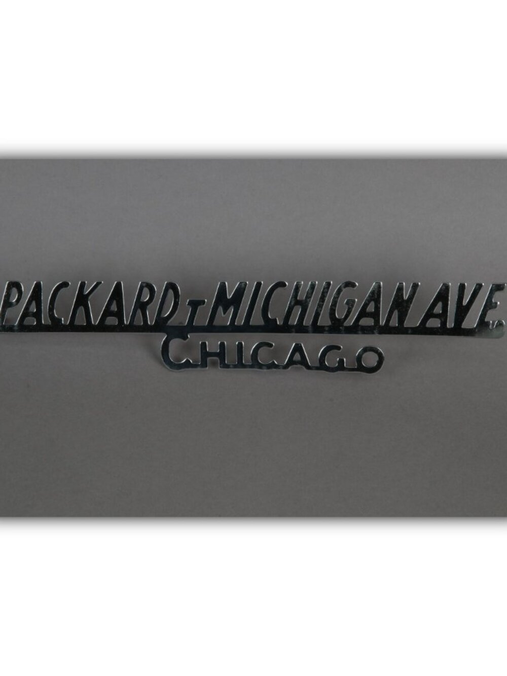 Vintage original Packard Michigan Ave. Chicago dealership trunk emblem